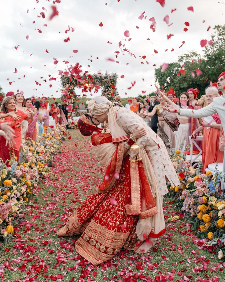 Wedding celebration with flower petals in the air